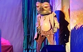 21577